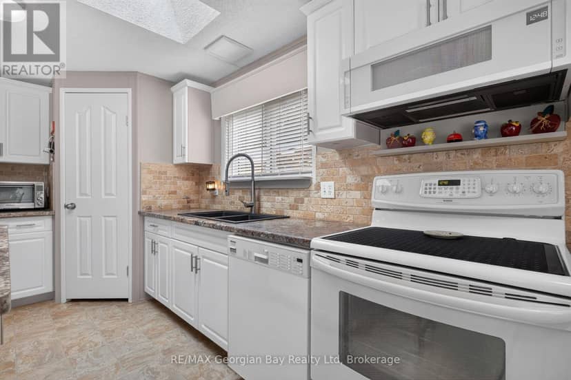 27 Scottsdale - 5411 Elliott Side Road — photo 6 of 38