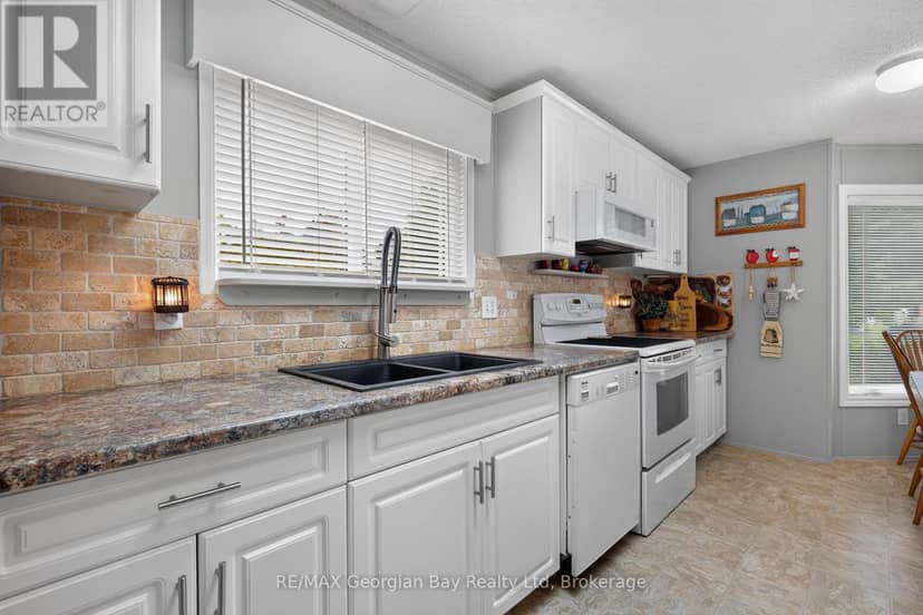 27 Scottsdale - 5411 Elliott Side Road — photo 7 of 38