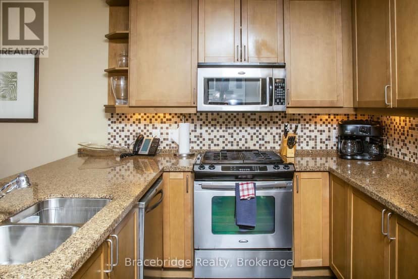 G102-C2 - 1869 Muskoka Road 118 Highway W, Muskoka Lakes, photo 3