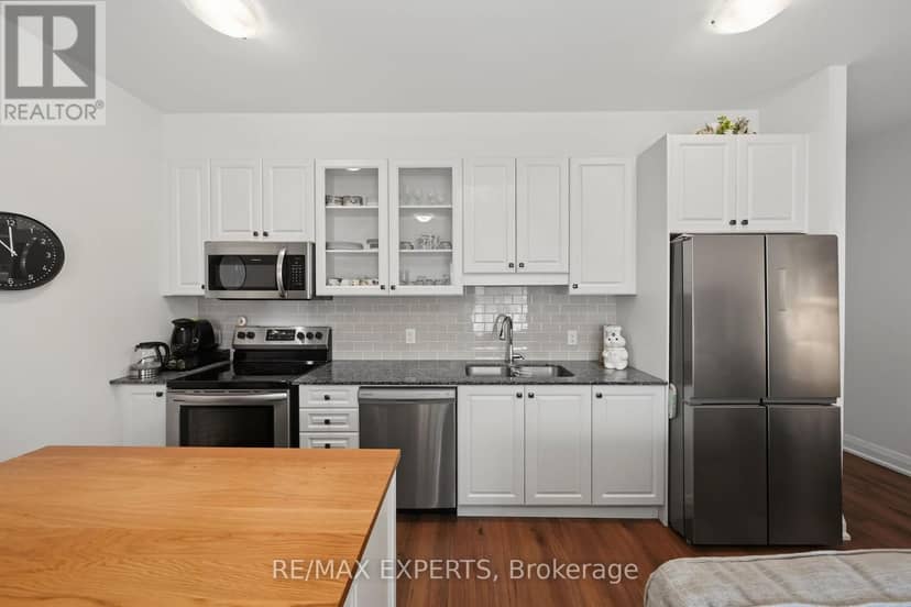 105 - 64 Queen Street S — photo 8 of 25