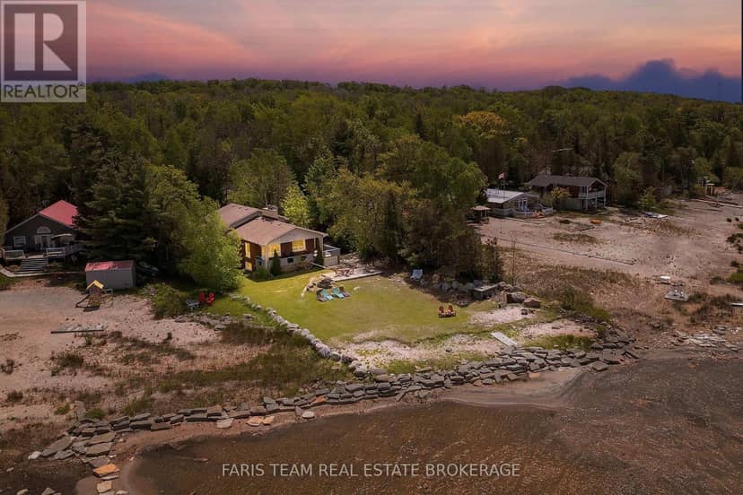 1787 Champlain Road — photo 1 of 40