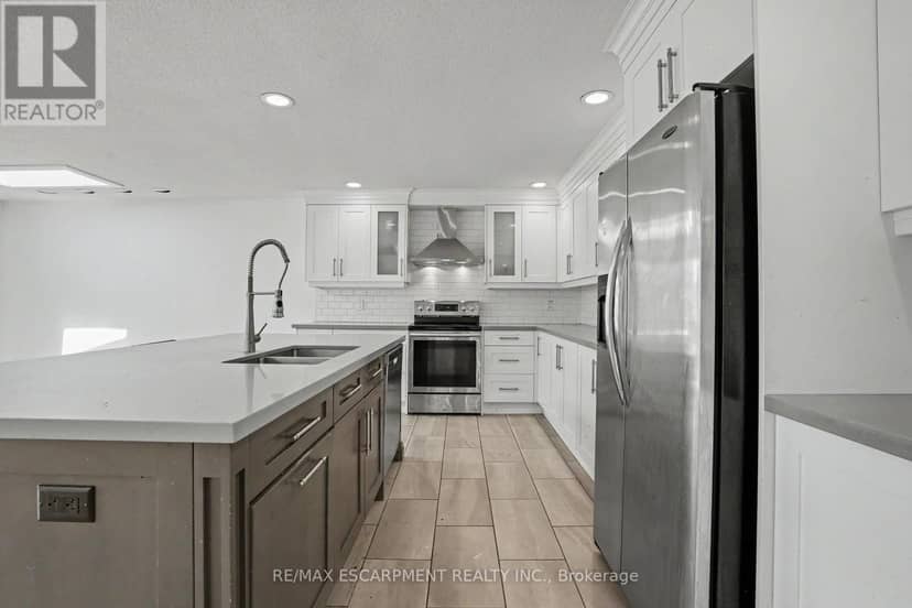 100 Hardale Crescent — photo 5 of 36