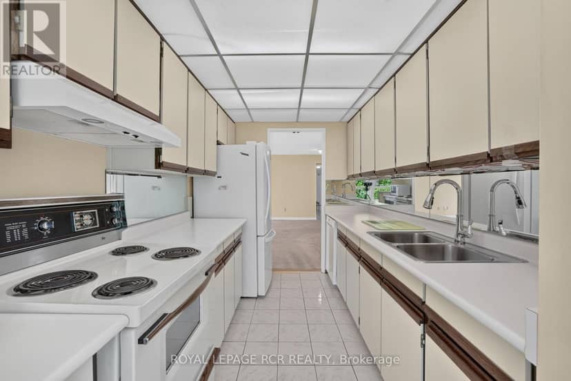 303 - 3650 Kaneff Crescent — photo 15 of 30