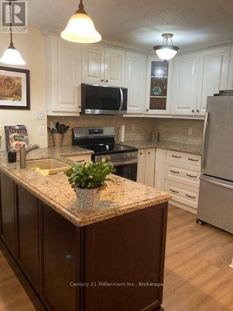 131 - 55 Trott Boulevard — photo 3 of 28
