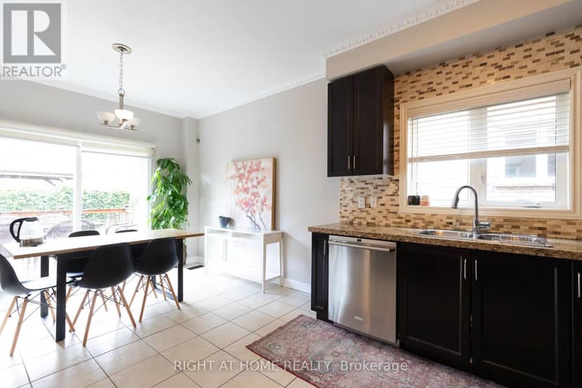182 Maurier Boulevard — photo 10 of 37