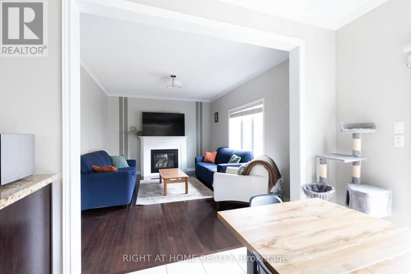 182 Maurier Boulevard — photo 4 of 37