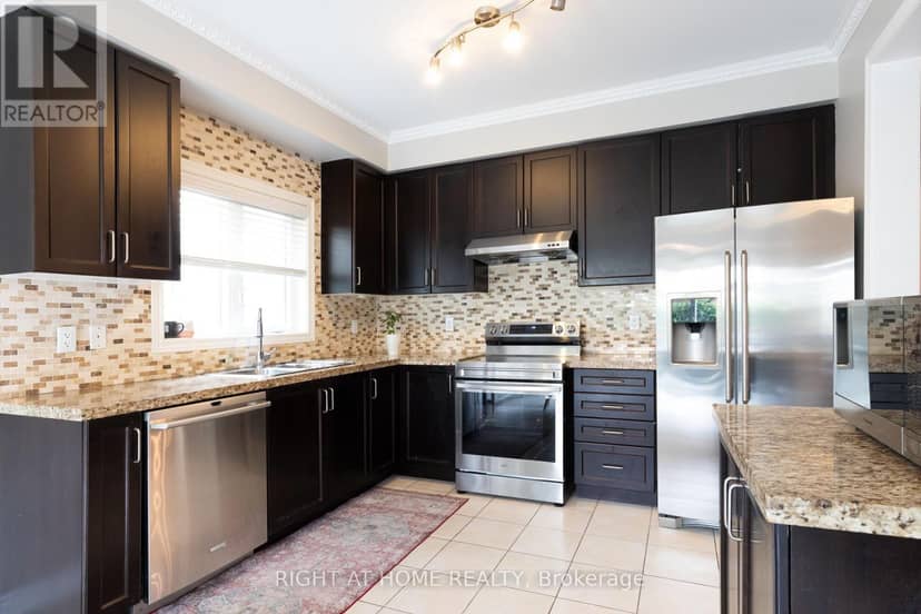 182 Maurier Boulevard — photo 8 of 37