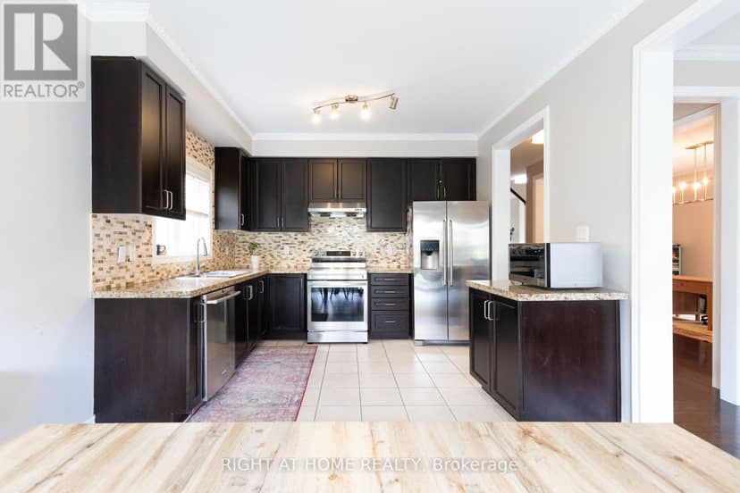 182 Maurier Boulevard — photo 9 of 37