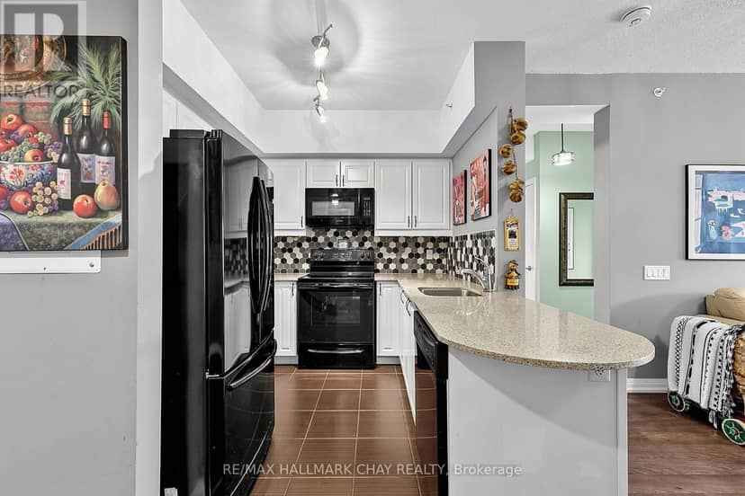 #304 - 300 Essa Road — photo 6 of 21