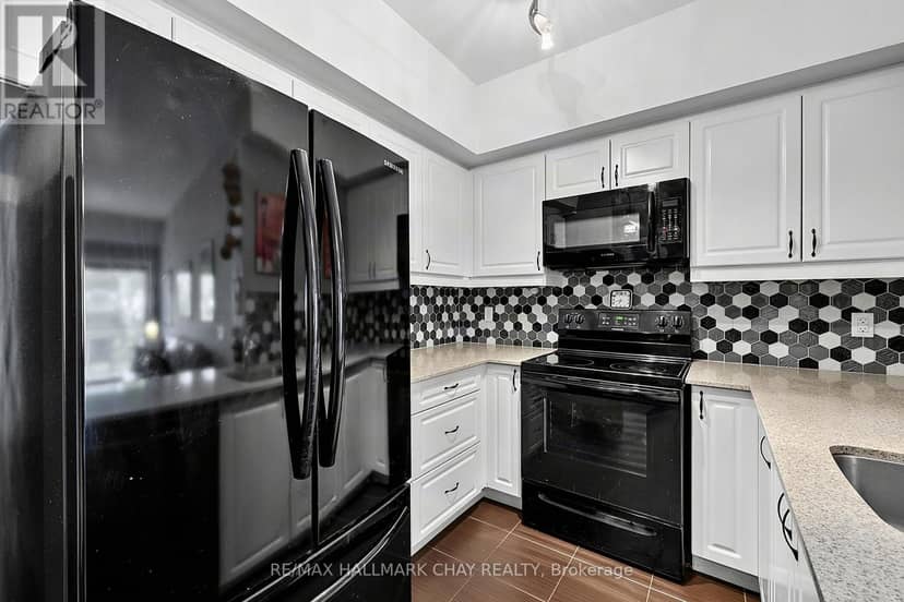 #304 - 300 Essa Road — photo 7 of 21