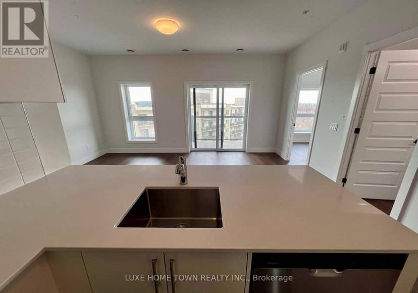 606 - 1000 Lackner Place — photo 1 of 7
