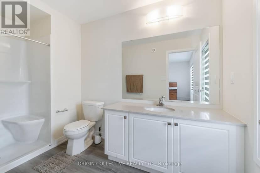 14 - 185 Bedrock Drive S — photo 9 of 40