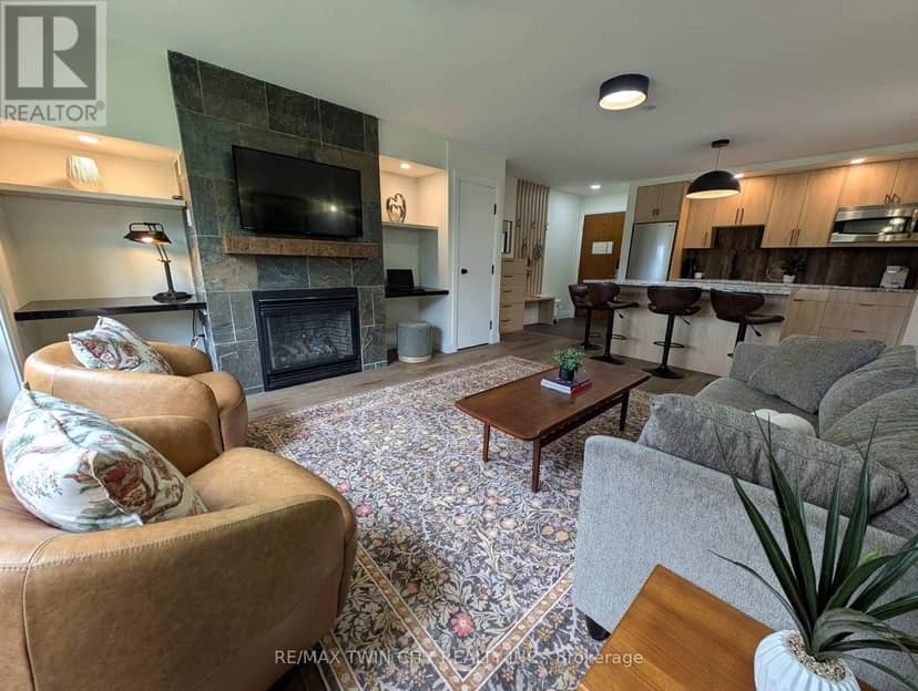 52-105 - 1235 Deerhurst Drive — photo 4 of 30