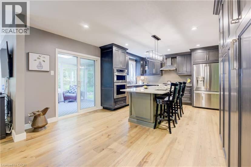 7664 MALTBY Road E — photo 10 of 37