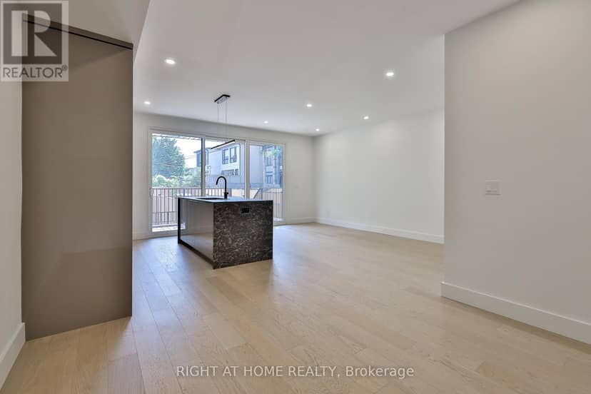 Ground Floor - 2343 Gerrard Street E — photo 2 of 26