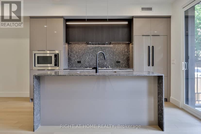 Ground Floor - 2343 Gerrard Street E — photo 6 of 26