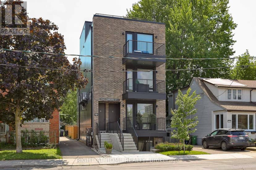Ground Floor - 2343 Gerrard Street E — photo 1 of 26