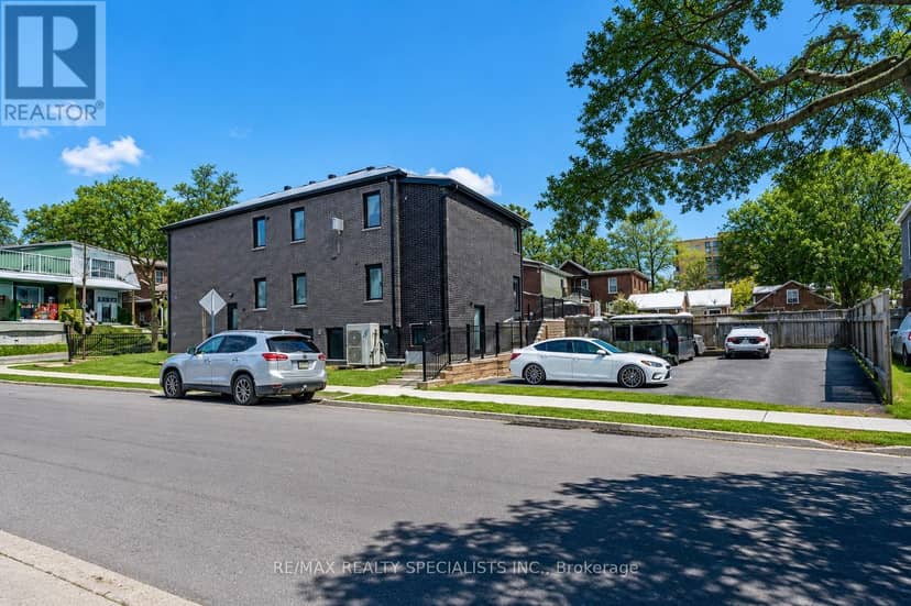 1659 Gerrard Street E — photo 1 of 40