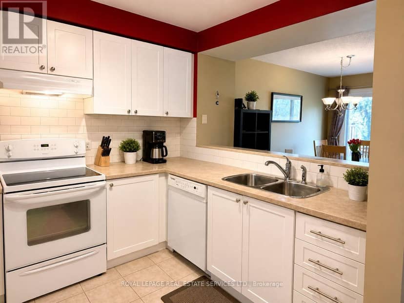 35 - 2920 Headon Forest Drive — photo 4 of 24