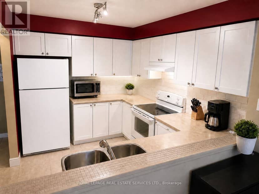 35 - 2920 Headon Forest Drive — photo 5 of 24
