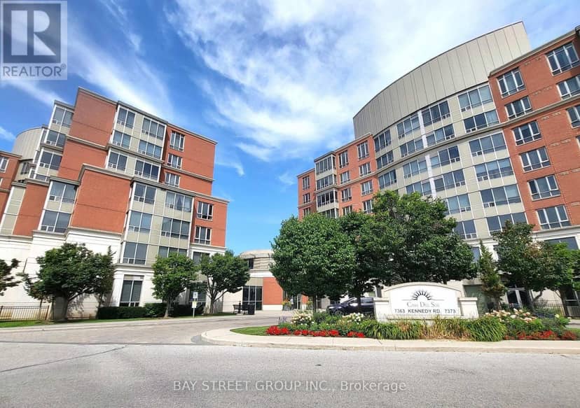 209 - 7363 Kennedy Road — photo 1 of 40