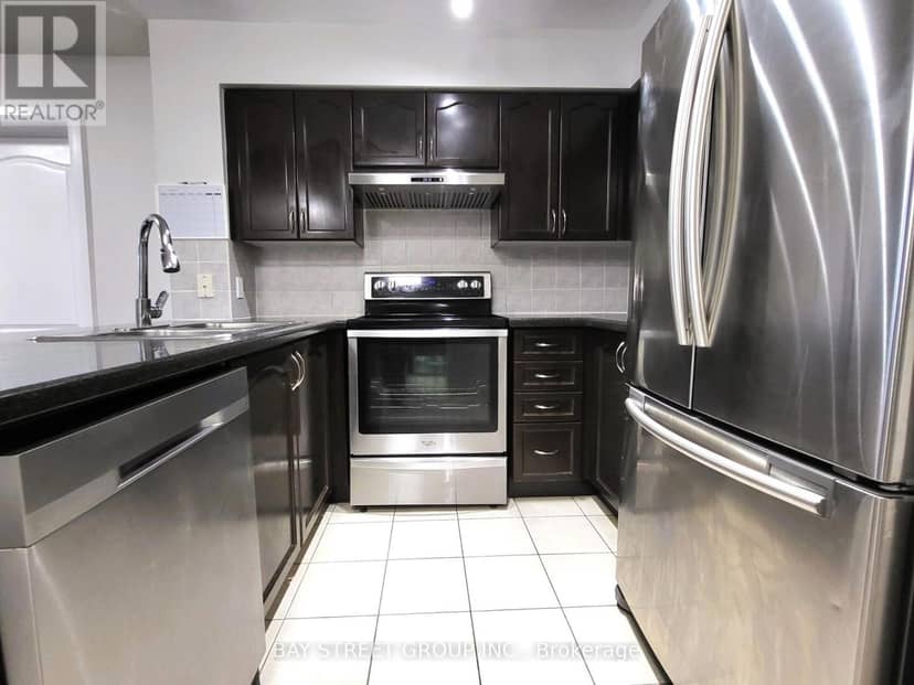 209 - 7363 Kennedy Road — photo 6 of 40