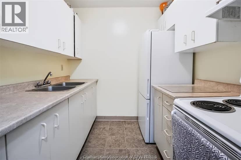 130 Park AVENUE East Unit# 404 — photo 3 of 7