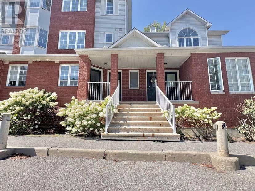 F - 112 Centrepointe Drive — photo 1 of 28