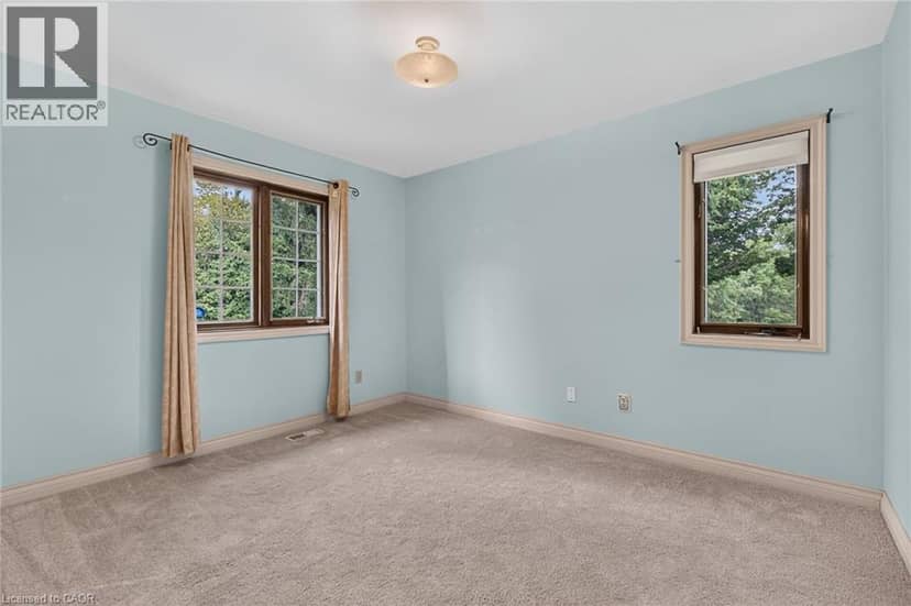 7011 DICKENSON Road E — photo 24 of 40