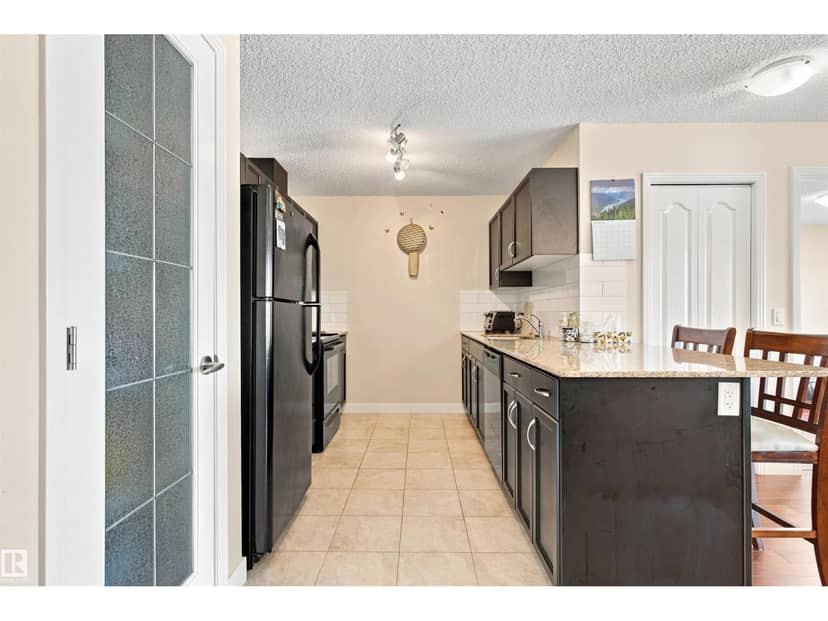 #406 12650 142 AV NW — photo 11 of 40
