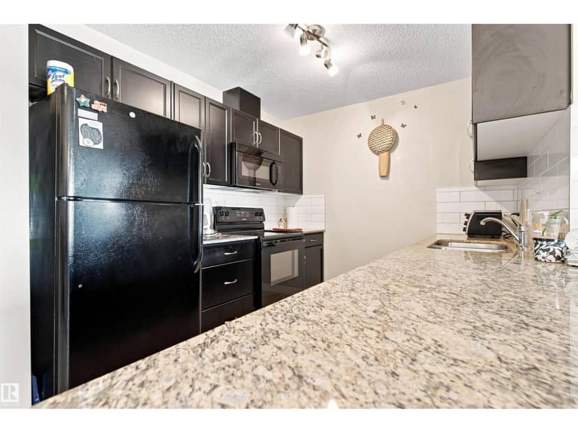#406 12650 142 AV NW — photo 13 of 40