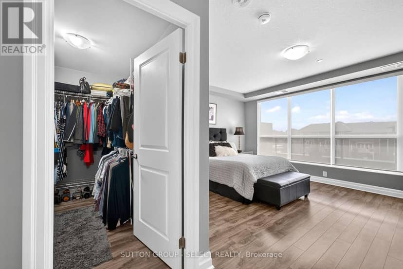 209 - 260 Villagewalk Boulevard — photo 16 of 40