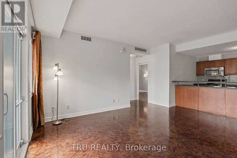 7 - 165 Waterbridge Drive — photo 2 of 22