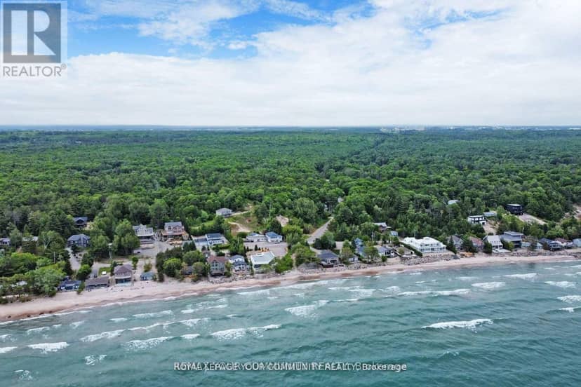 1207 Tiny Beaches Road S — photo 1 of 36