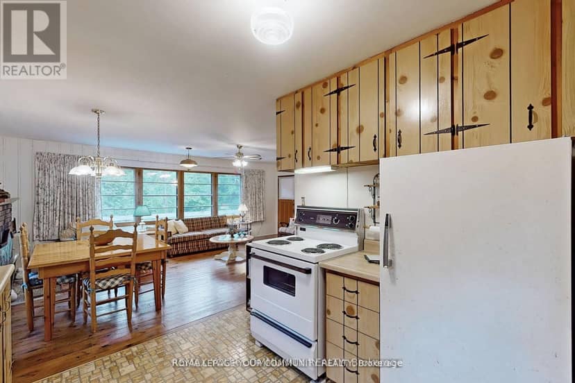 1207 Tiny Beaches Road S — photo 13 of 36