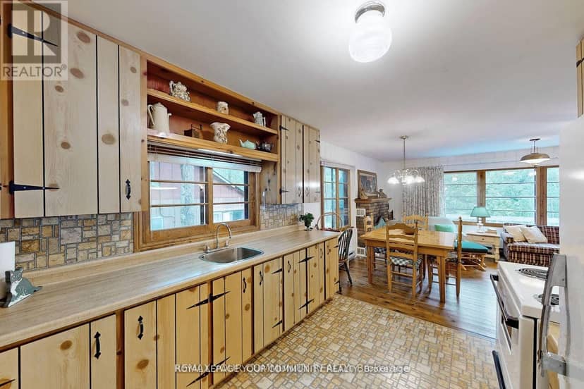 1207 Tiny Beaches Road S — photo 14 of 36