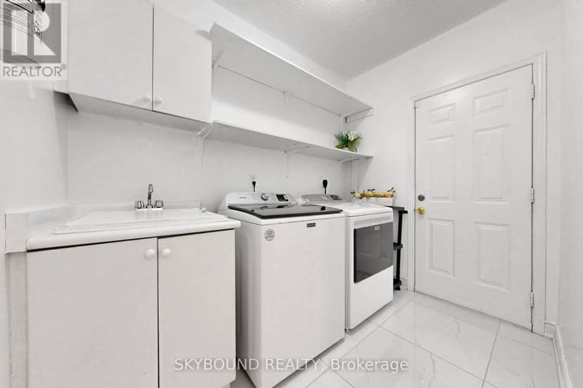 5925 Manzanillo Crescent — photo 10 of 40
