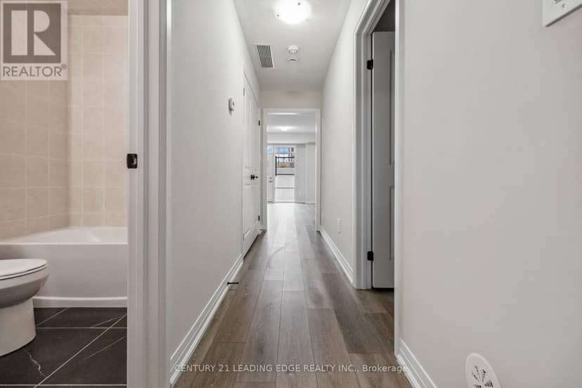 128 - 1569 Rose Way — photo 28 of 31