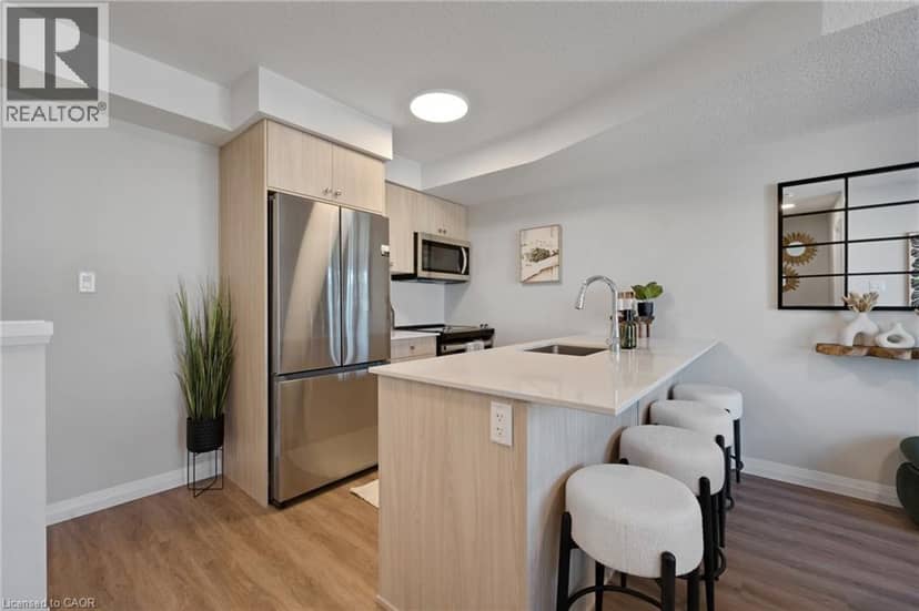 410 NORTHFIELD Drive W Unit# D16 — photo 8 of 24