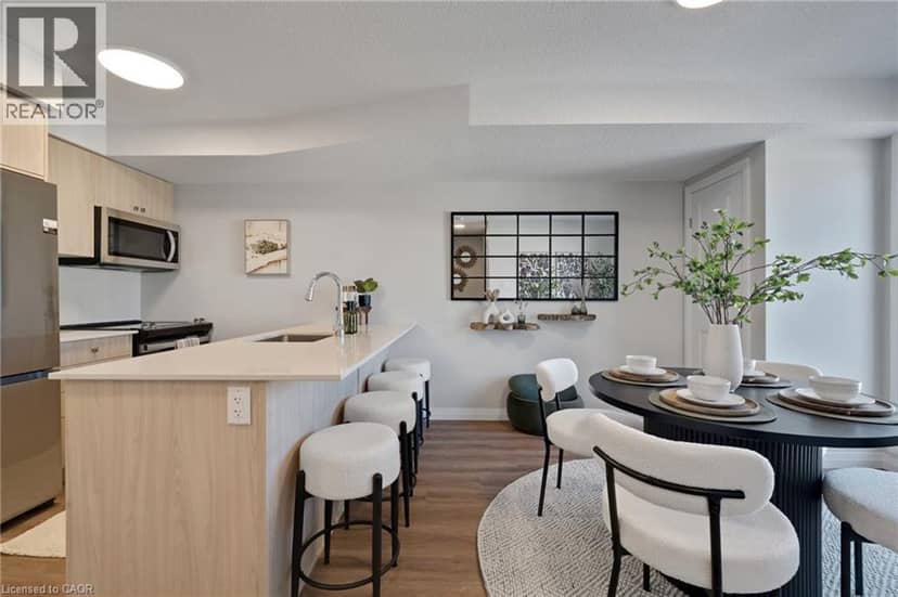 410 NORTHFIELD Drive W Unit# D10 — photo 10 of 24