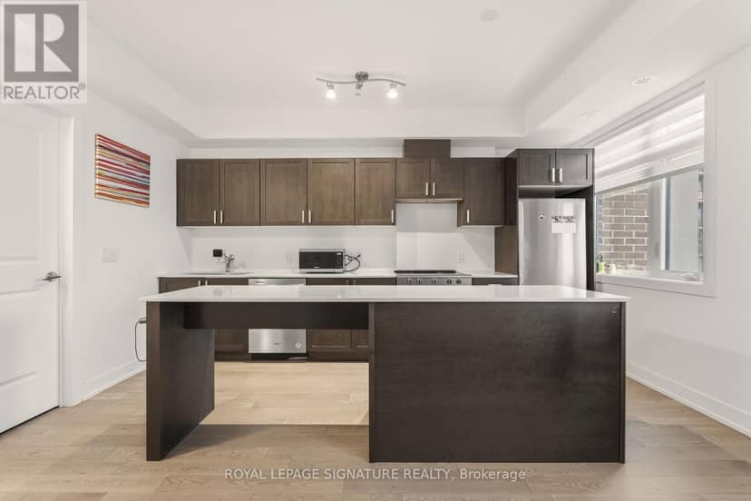 227 - 1062 Douglas McCurdy Common — photo 7 of 38