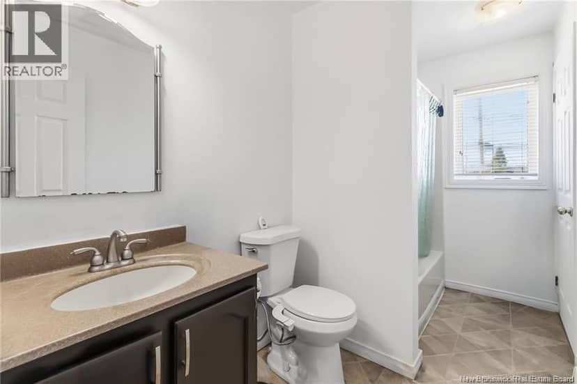 27 Woodstone Crescent — photo 6 of 19