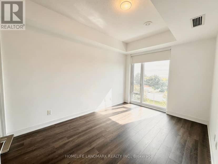 312 - 30 Samuel Wood Way — photo 6 of 9