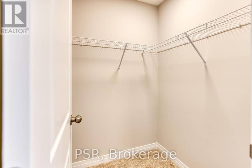 200 Rivergreen Crescent — photo 7 of 40