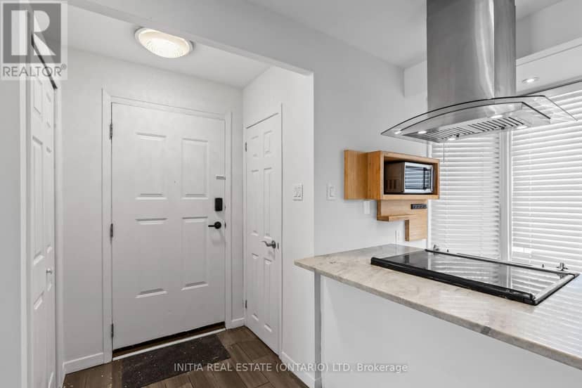 19 - 55 Arbour Glen Crescent — photo 4 of 23