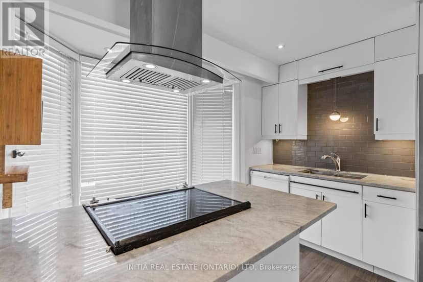 19 - 55 Arbour Glen Crescent — photo 5 of 23