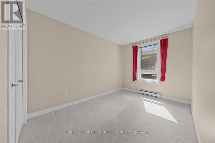 205 - 939 North River Road — photo 21 of 34