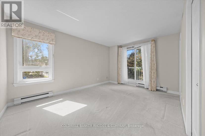 205 - 939 North River Road — photo 25 of 34