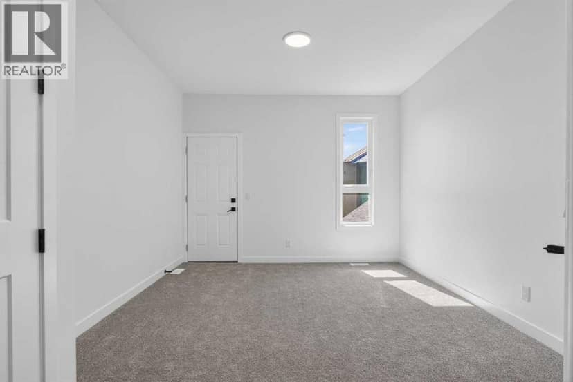 4907 Bowness Road NW — photo 15 of 40