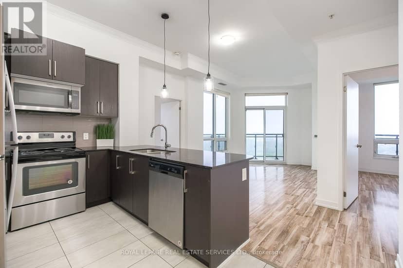 1605 - 840 Queens Plate Drive — photo 11 of 25